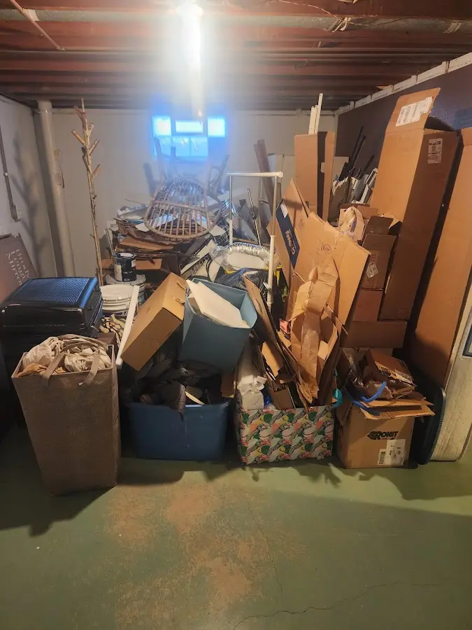 Roll-off dumpster container at job site for Concrete Dumpster Rental in Inverness